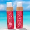 Cocosolis Watermelon Sun Tan & Body Oil two oils on the beach